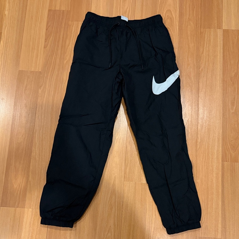 Nike swoosh black track pants. Small. Perfect condition